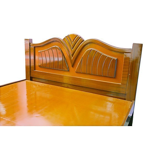 Brown wooden cot