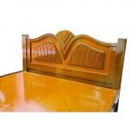 Brown wooden cot